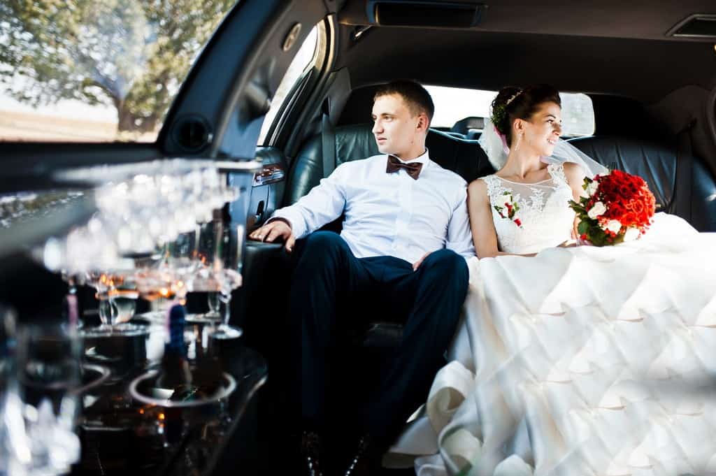 wedding couple indoor the limousine